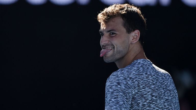 Bulgaria's Grigor Dimitrov celebrates his victory against Belgium's David Goffin during their men's singles quarter-final match on day ten of the Australia