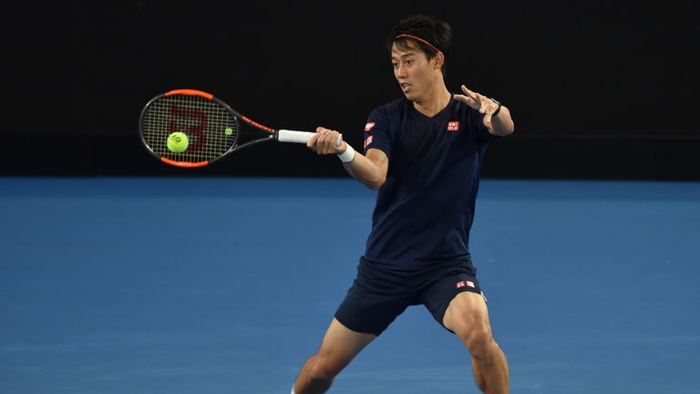 Kei Nishikori of Japan hits a return during a practice session ahead of the Australian Open