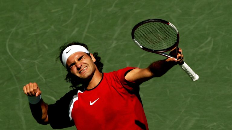 Roger Federer of Switzerland celebrates match point after defeating Rafael Nadal of Spain in the men's final