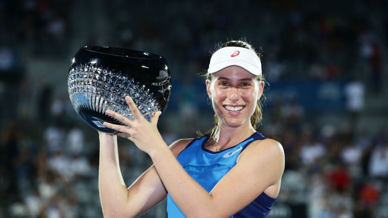 Johanna Konta poses with the winners trophy after the Womens Final match against Agnieszka Radwanska 