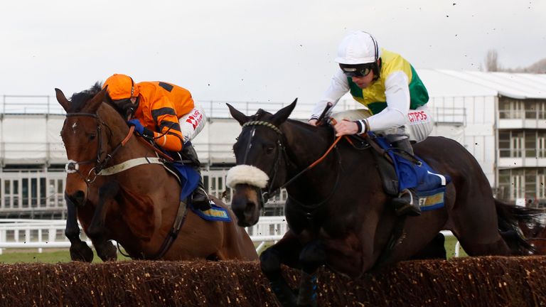 Many Clouds jump an early fence in company with Thistlecrack
