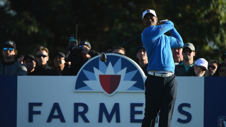 SAN DIEGO, CA - JANUARY 26: Tiger Woods plays his shot from the 18th tee  during the first round of the Farmers Insurance Open at Torrey Pines South on Jan