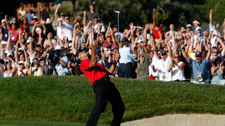 SAN DIEGO - JUNE 15:  Tiger Woods reacts to his birdie putt on the 18th green to force a playoff with Rocco Mediate during the final round of the 108th U.S