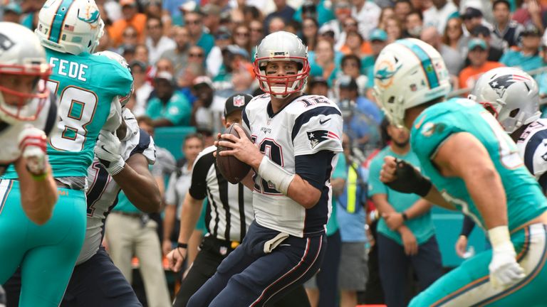 MIAMI GARDENS, FL - JANUARY 01: Tom Brady #12 of the New England Patriots looks downfield during the 1st quarter against the Miami Dolphins at Hard Rock St