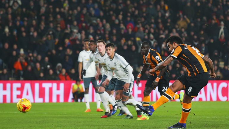 HULL, ENGLAND - JANUARY 26:  Tom Huddlestone of Hull City scores their first goal from the penalty spot during the EFL Cup Semi-Final second leg match betw