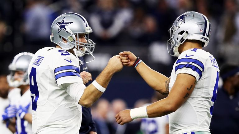 ARLINGTON, TX - JANUARY 15:  Tony Romo #9 and Dak Prescott #4 of the Dallas Cowboys meet before the NFC Divisional Playoff Game against the Green Bay Packe