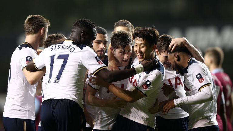 LONDON, ENGLAND - JANUARY 08: Ben Davies of Tottenham Hotspur (C) celebrates scoring his sides first goal with his Tottenham Hotspur team mates during The 