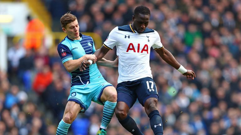 Dominic Gape of Wycombe Wanderers and Moussa Sissoko of Tottenham Hotspur compete for the ball