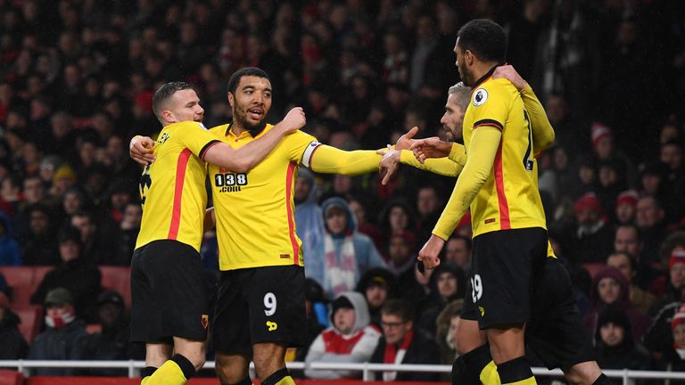 LONDON, ENGLAND - JANUARY 31:  Troy Deeney (2nd L) of Watford celebrates scoring his team's second goal with his team mates during the Premier League match