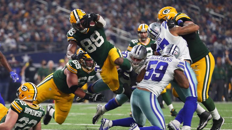 ARLINGTON, TX - JANUARY 15:  Ty Montgomery #88 of the Green Bay Packers dives into the end zone to score a touchdown during the second quarter against the 