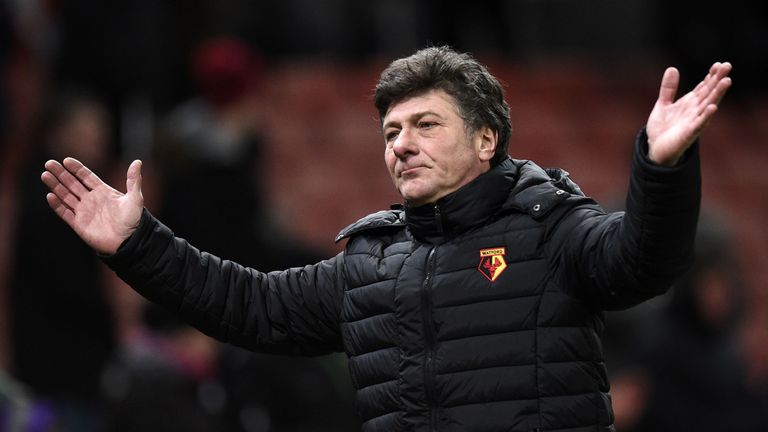 Watford's Italian manager Walter Mazzarri gestures as he leaves the pitch