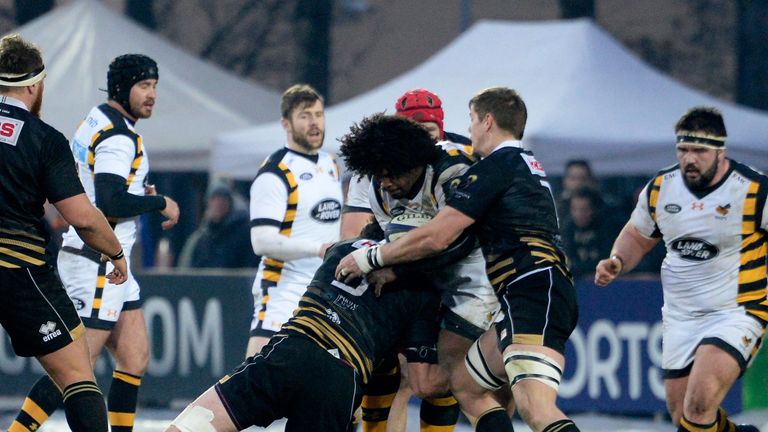 PARMA, ITALY - JANUARY 21:  Ashley Johnson (C) of Wasps is challenged during the European Rugby Champions Cup match between Zebre Rugby and Wasps at  Stadi