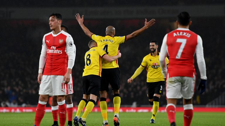 LONDON, ENGLAND - JANUARY 31:  Younes Kaboul (C) of Watford celebrates scoring the opening goal with his team mate Tom Cleverley (2nd L) during the Premier