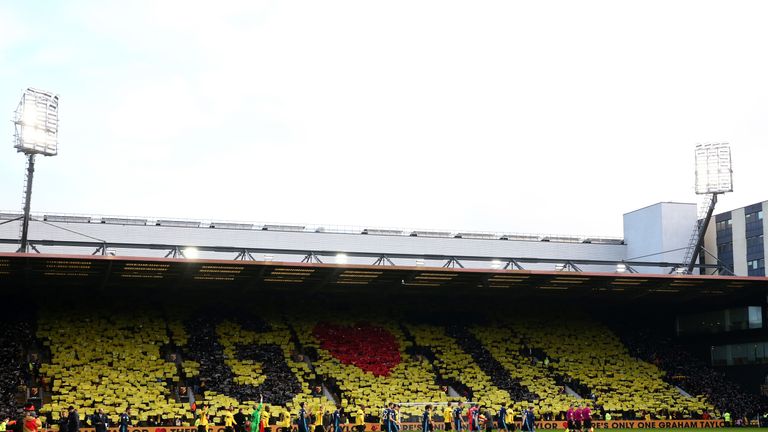 WATFORD, ENGLAND - JANUARY 14:  Watford fans create a display with cards as they pay tribute to former manager Graham Taylor who passed away at the age of 