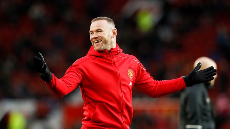 Wayne Rooney appears in good spirits before the Premier League match with Liverpool at Old Trafford
