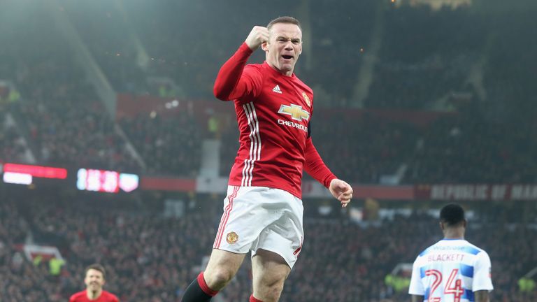 Wayne Rooney celebrates the FA Cup goal against Reading that equalled Sir Bobby Charlton's club record for Manchester United