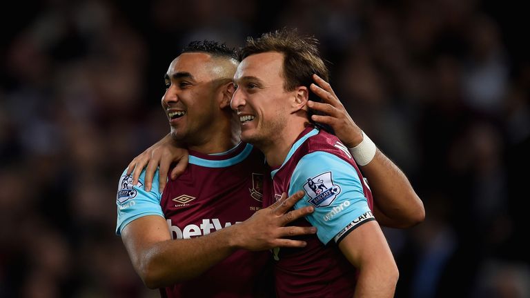 Mark Noble (R) celebrates with Dimitri Payet (L)