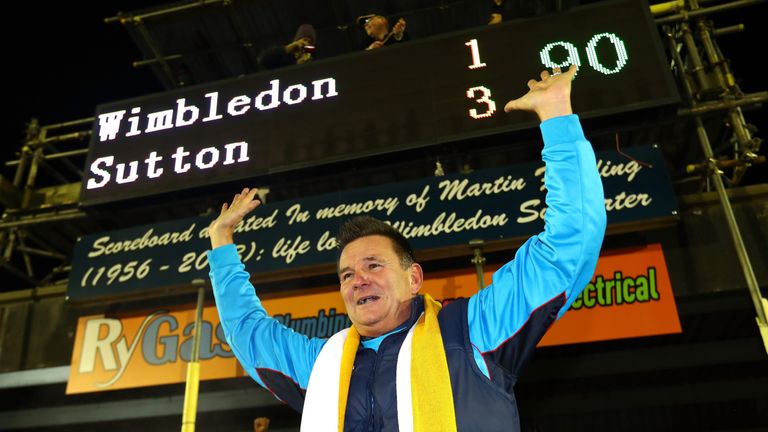 KINGSTON UPON THAMES, ENGLAND - JANUARY 17:  Paul Doswell, Manager of Sutton United celebrates victory after the Emirates FA Cup third round replay between