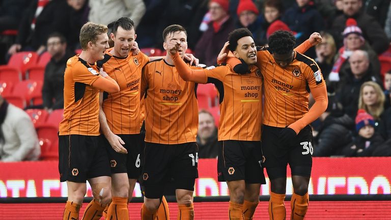 Hélder Costa of Wolverhampton Wanderers celebrates with team mates after scoring against Stoke in the FA Cup third round