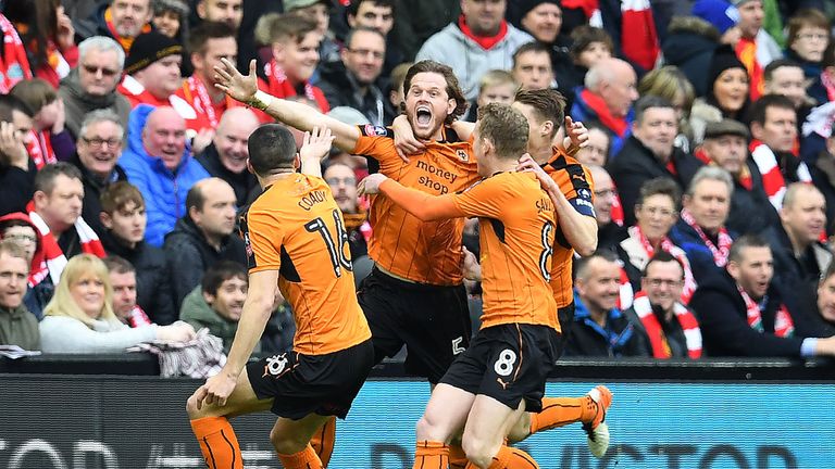 Richard Stearman (C) celebrates with team-mates after scoring for Wolves against Liverpool in the FA Cup fourth round