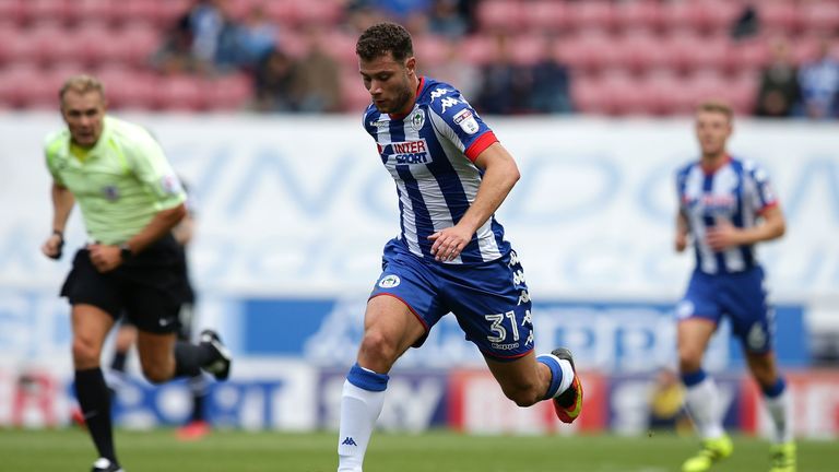 WIGAN, ENGLAND - AUGUST 13:  Yanic Wildschut of Wigan Athletic controls the ball during the Sky Bet Championship League match between Wigan Athletic and Bl