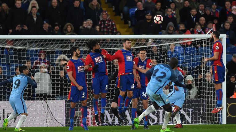 LONDON, ENGLAND - JANUARY 28:  Yaya Toure of Manchester City scores his side's third goal from a free kick during the Emirates FA Cup Fourth Round match be
