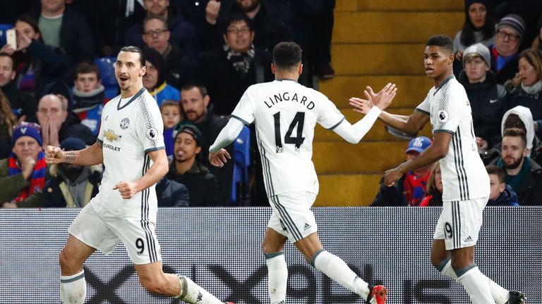 Manchester United's Swedish striker Zlatan Ibrahimovic (L) celebrates scoring their second goal with Manchester United's English midfielder Jesse Lingard (