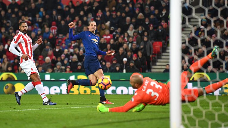 STOKE ON TRENT, ENGLAND - JANUARY 21: Zlatan Ibrahimovic of Manchester United (C) shoots during the Premier League match between Stoke City and Manchester 