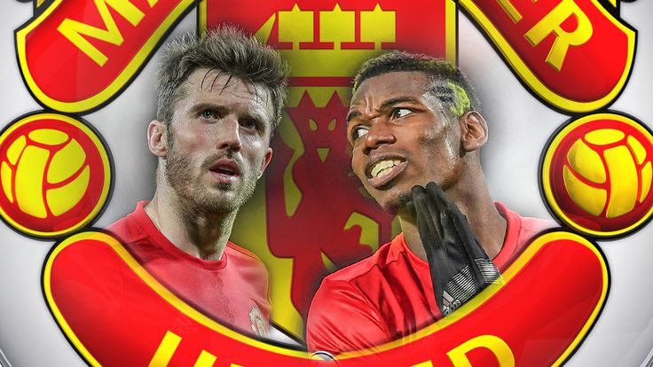 Manchester United midfielders Michael Carrick and Paul Pogba