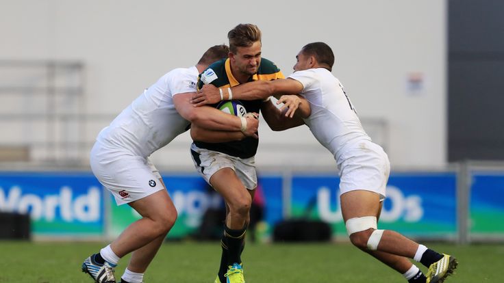 South Africa's Jeremy Ward is tackled by England's Will Stuart and Joe Marchant during the Under 20's Rugby Union World Cup, Semi Final match 2017