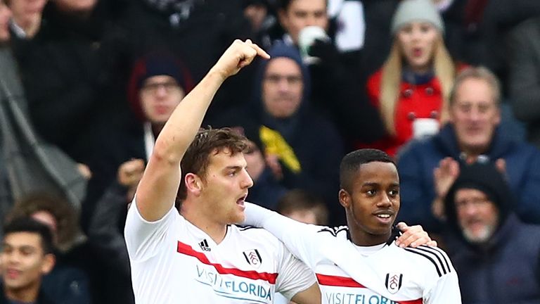 Chris Martin of Fulham celebrates alongside Ryan Sessegnon after scoring against Hull in the FA Cup