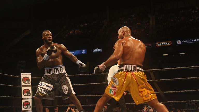 BIRMINGHAM, AL - FEBRUARY 25:  WBC World Heavyweight Champion Deontay Wilder (L) fights Gerald Washington (R) at Legacy Arena at the BJCC on February 25, 2