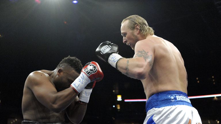 Finland's Robert Helenius (R), "the Nordic Nightmare", fights with Great Britain's Dereck Chisora, "Del Boy", during their heavyweight class European Champ