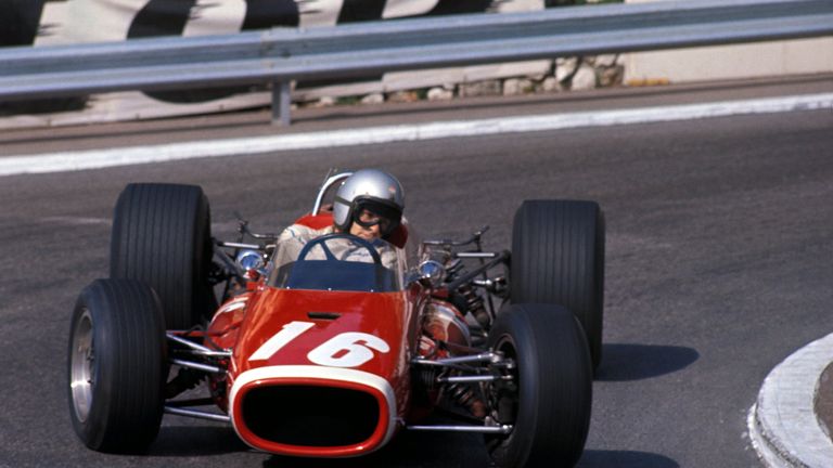 Bruce McLaren sports a red livery on his McLaren at Monaco in 1967