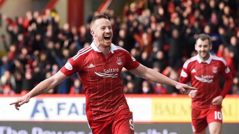 Aberdeen's Adam Rooney celebrates his goal against Ross County
