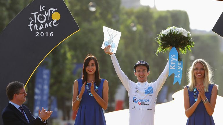 PARIS, FRANCE - JULY 24:  Adam Yates of Great Britain and Orica Greenedge celebrates as he is crowned the best young rider following stage twenty one of th