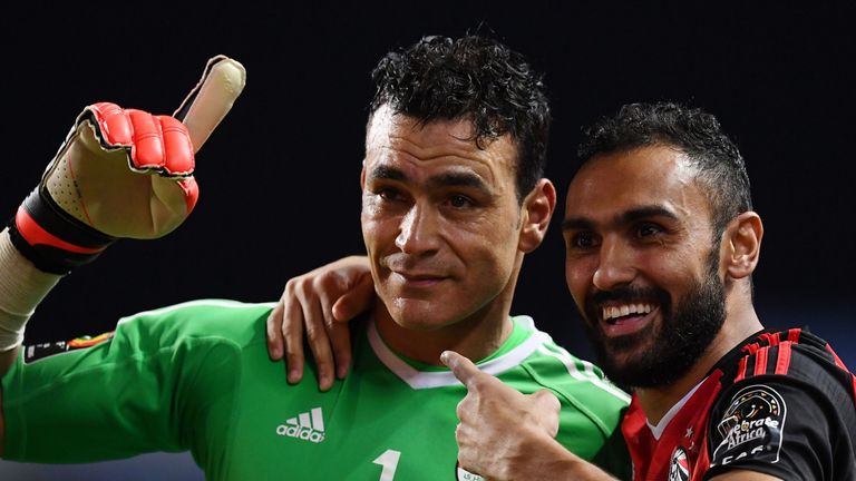 Egypt's goalkeeper Essam El-Hadary (L) and midfielder Ahmed Elmohamady celebrate at the end of the penalty shootout