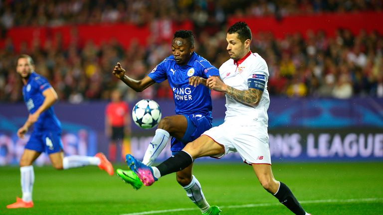 Ahmed Musa (L) vies with Vitolo, Sevilla v Leicester, Champions League
