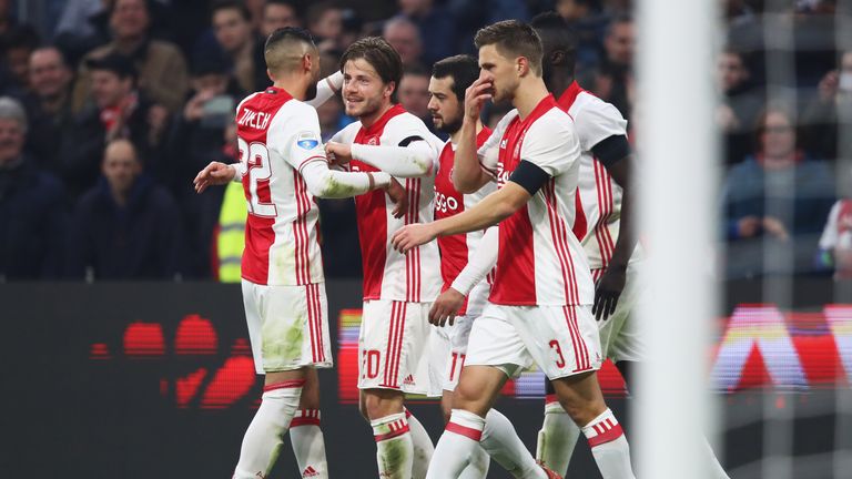 AMSTERDAM, NETHERLANDS - JANUARY 29:  Lasse Schone of Ajax celebrates scoring his teams second goal of the game after he shoots and scores a goal direct fr