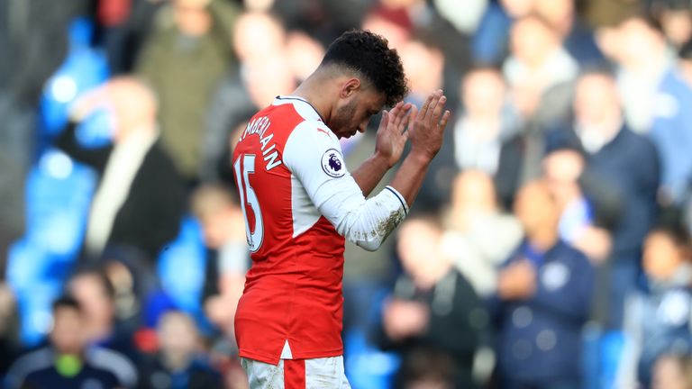 Alex Oxlade-Chamberlain looks dejected after the final whistle