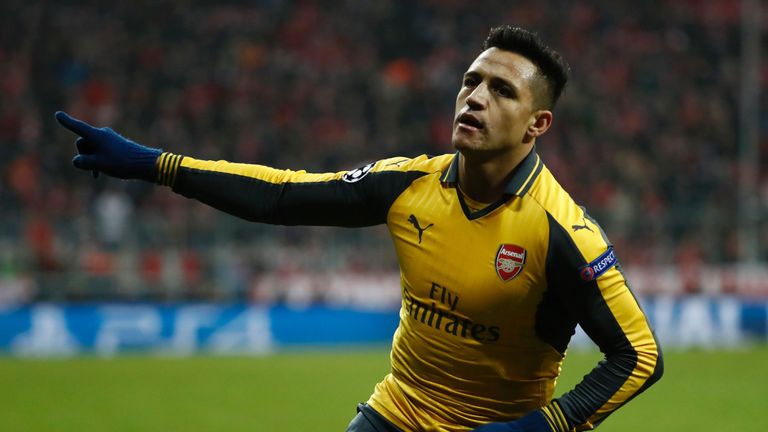 Alexis Sanchez celebrates after equalising for Arsenal in the Allianz Arena