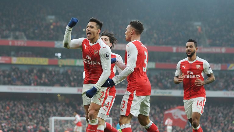 Alexis Sanchez celebrates scoring Arsenal's opener against Hull