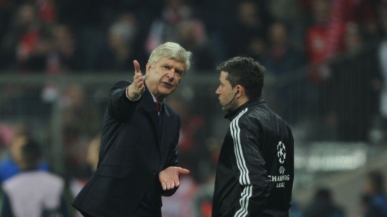 Arsene Wenger questions a decision during Arsenal's loss to Bayern Munich at the Allianz Arena