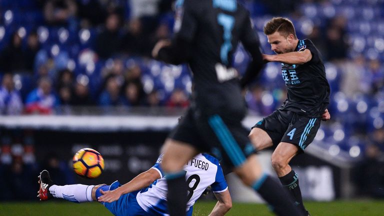 Real Sociedad's midfielder Asier Illarramendi (R) kicks to score during the Spanish league football match RCD Espanyol vs Real Sociedad at the RCDE Stadiu