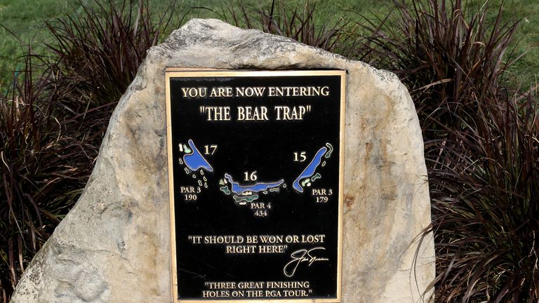 A plaque and statue commemorating "The Bear Trap" at The Honda Classic at PGA National