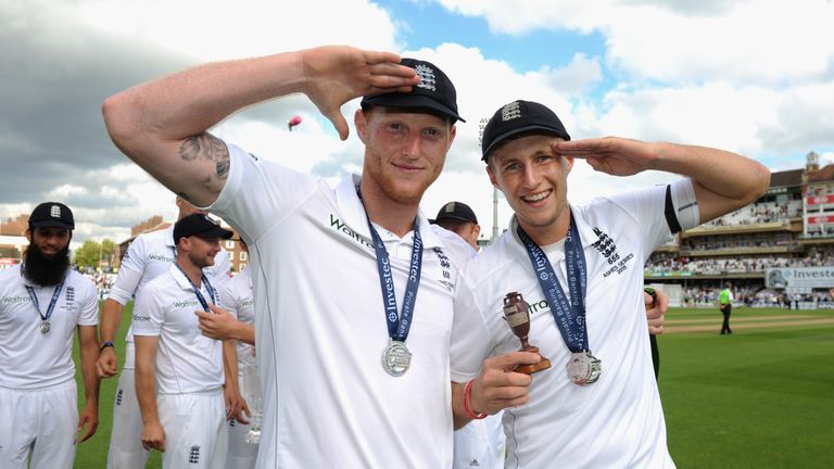 LONDON, ENGLAND - AUGUST 23:  England players Ben Stokes (l) and Joe Root celebrate winning the ashes after day four of the 5th Investec Ashes Test match b