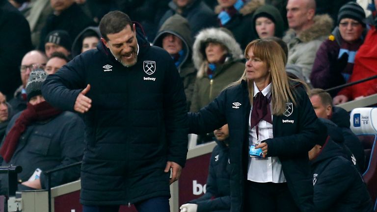 Slaven Bilic (left) is escorted from the touchline