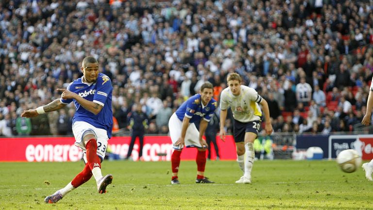 Portsmouth's Ghanaian player Kevin Prince Boateng scores his penalty, Portsmouth's second goal during extra-time in the FA Cup semi-final football match be