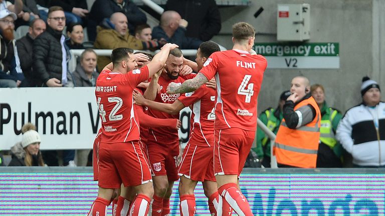Bristol City celebrate after Aaron Wilbraham (centre) scores their first goal during the Sky Bet Championship match at St James' Park, Newcastle.