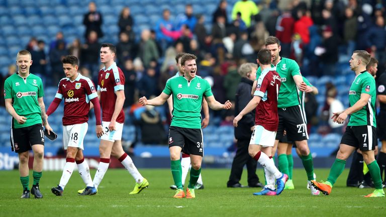 Burnley's players show their despair after losing to non-league Lincoln in the cup 